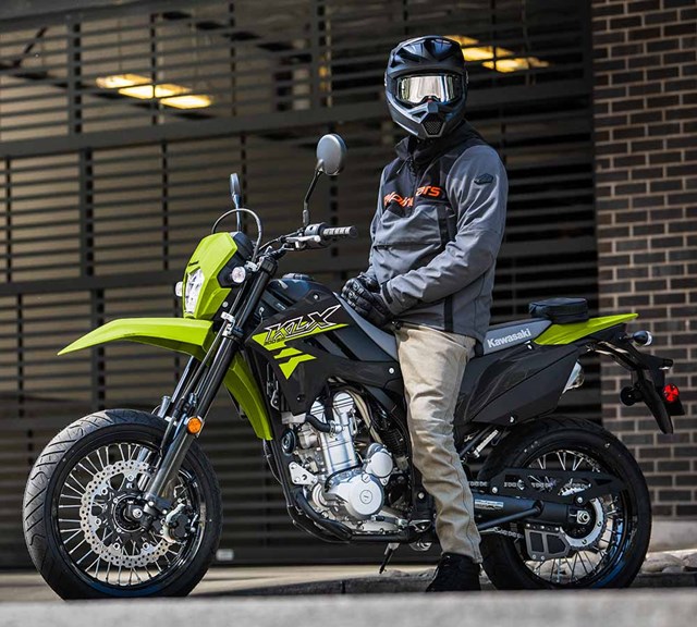 Image of 2026 KLX300SM in action