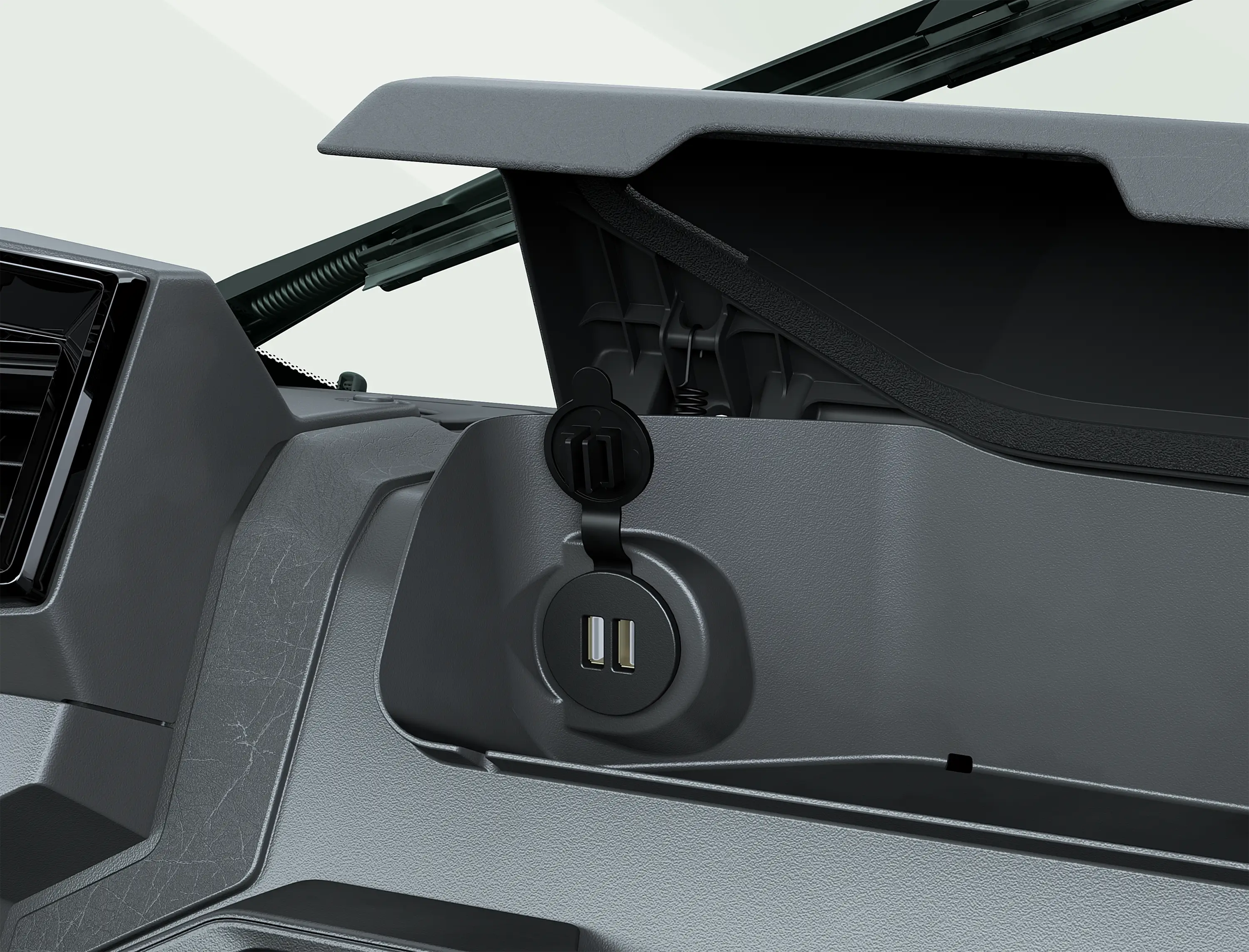 Close-up on a side x side interior storage compartment.