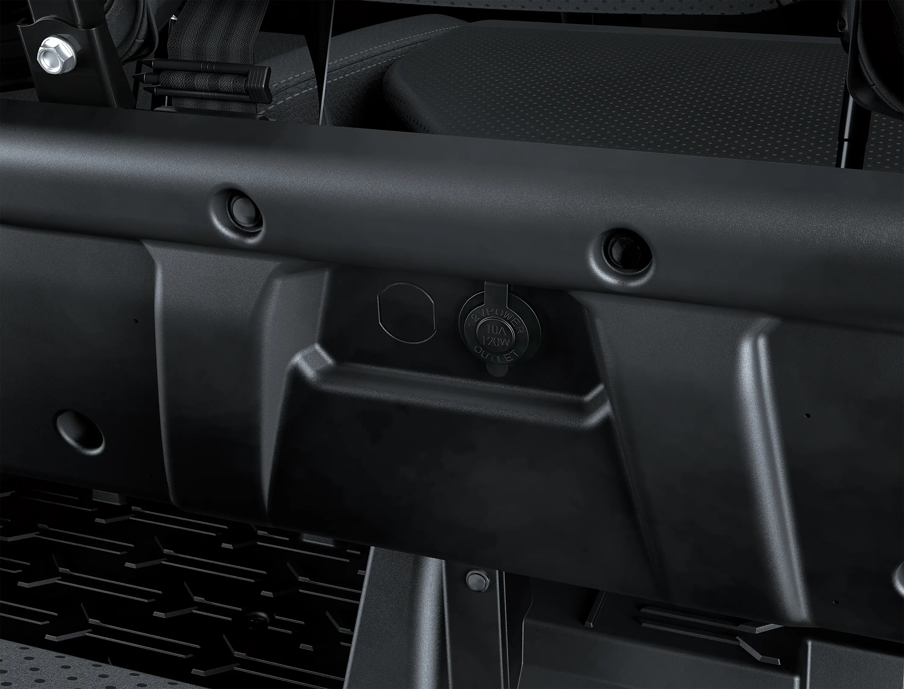 Close-up on a side x side interior charge ports.