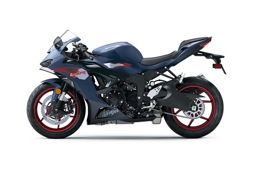 Profile angle of a blue motorcycle staged in a white studio background. opens in a new window