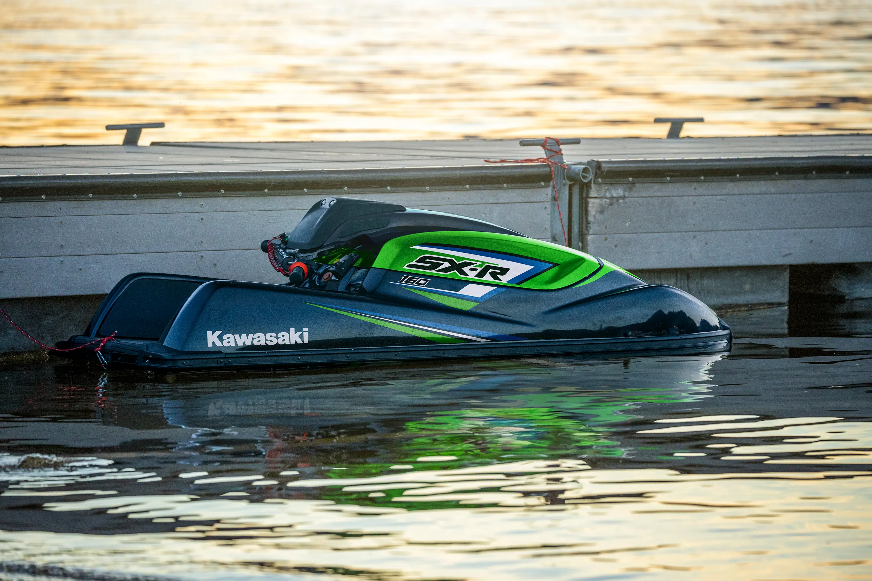 Personal watercraft sitting on the water.