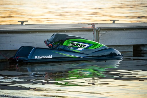 Personal watercraft sitting on the water. opens in a new window