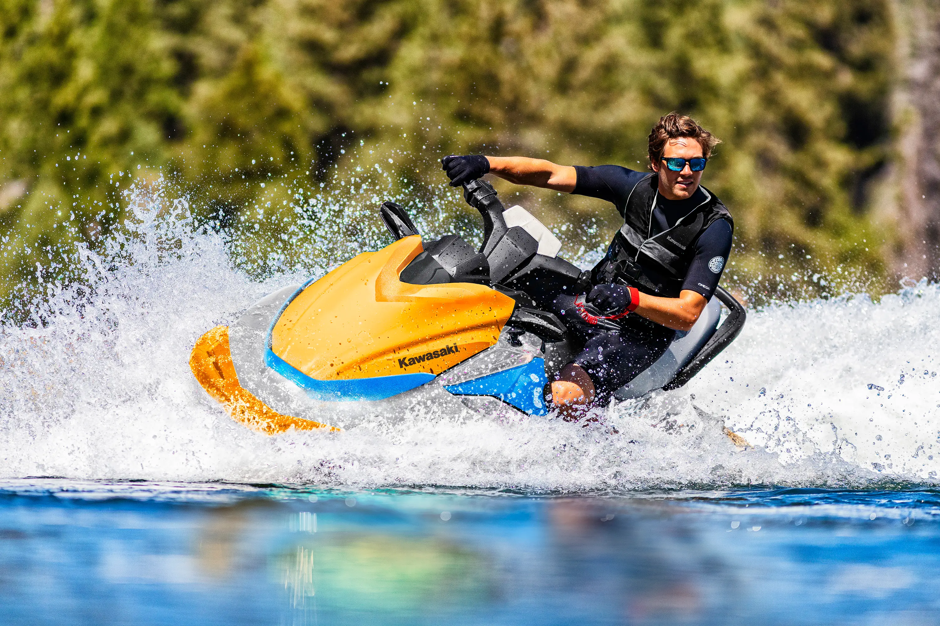 Person turning on a watercraft on the water.