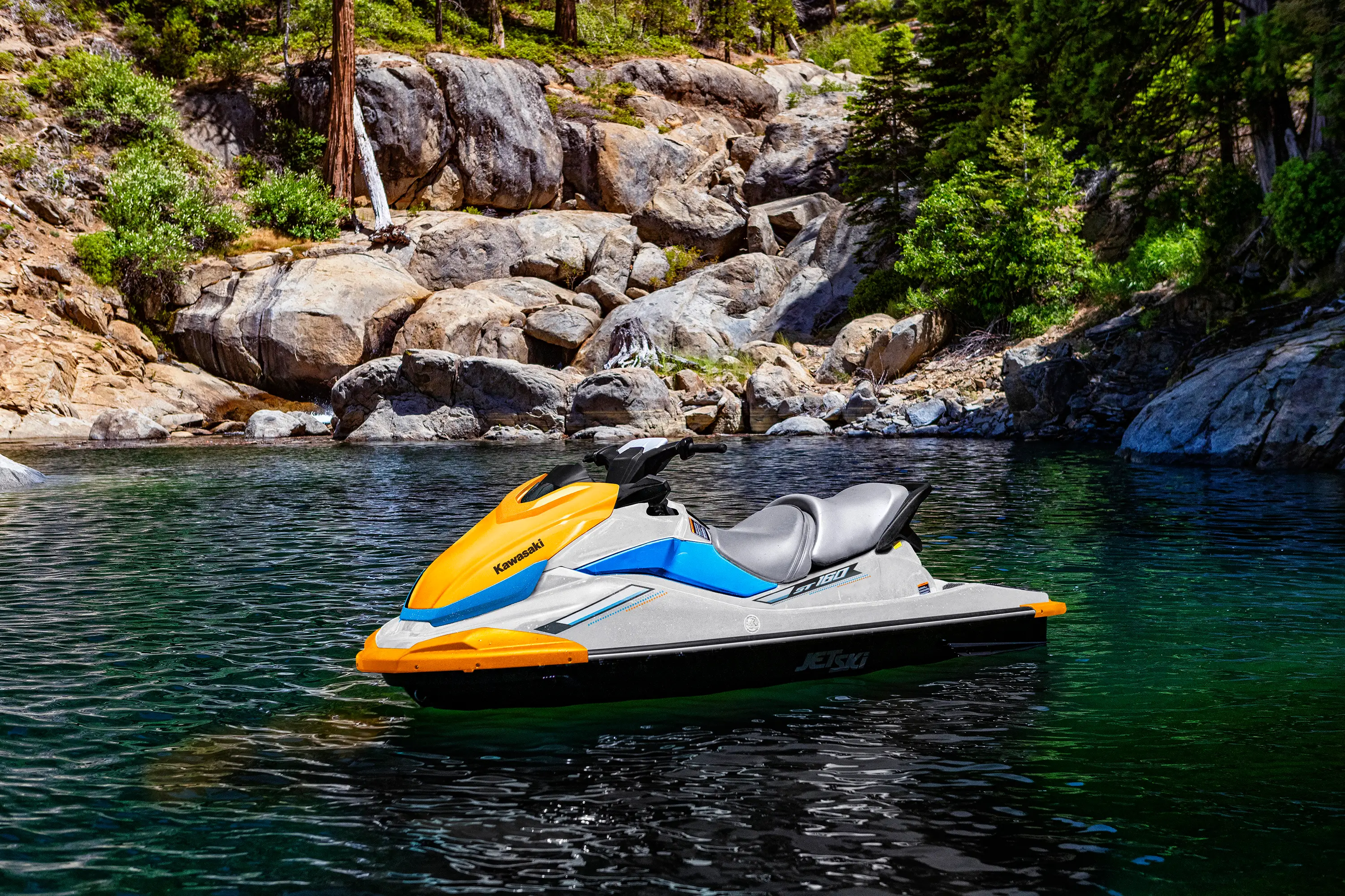 Personal watercraft sitting on the water.