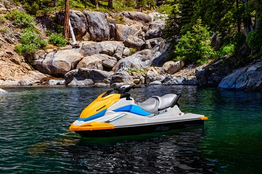 Personal watercraft sitting on the water. opens in a new window