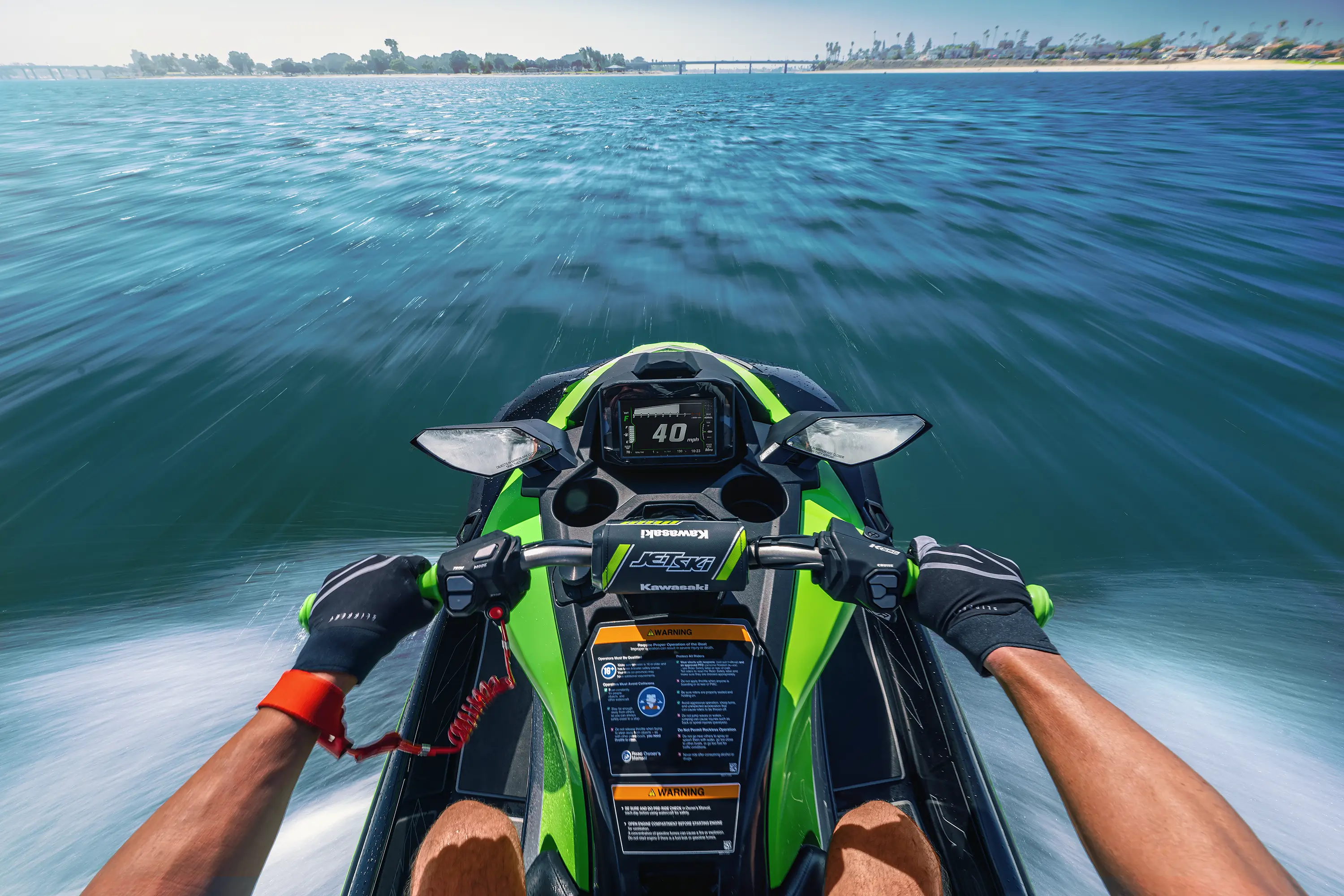 Rider POV of a personal watercraft on the water.