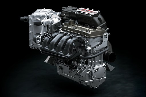 Engine of a personal watercraft staged in a black studio background. opens in a new window