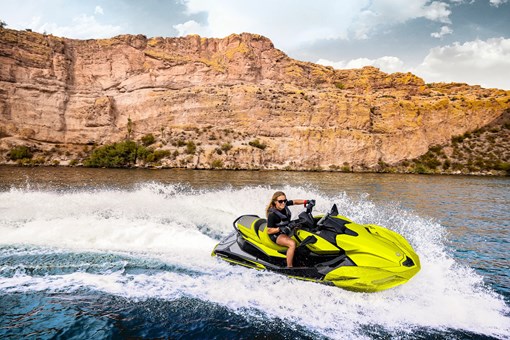 Person turning a personal watercraft on the water. opens in a new window