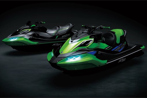 Three-quarter front angle of two personal watercraft staged in a black studio background. opens in a new window
