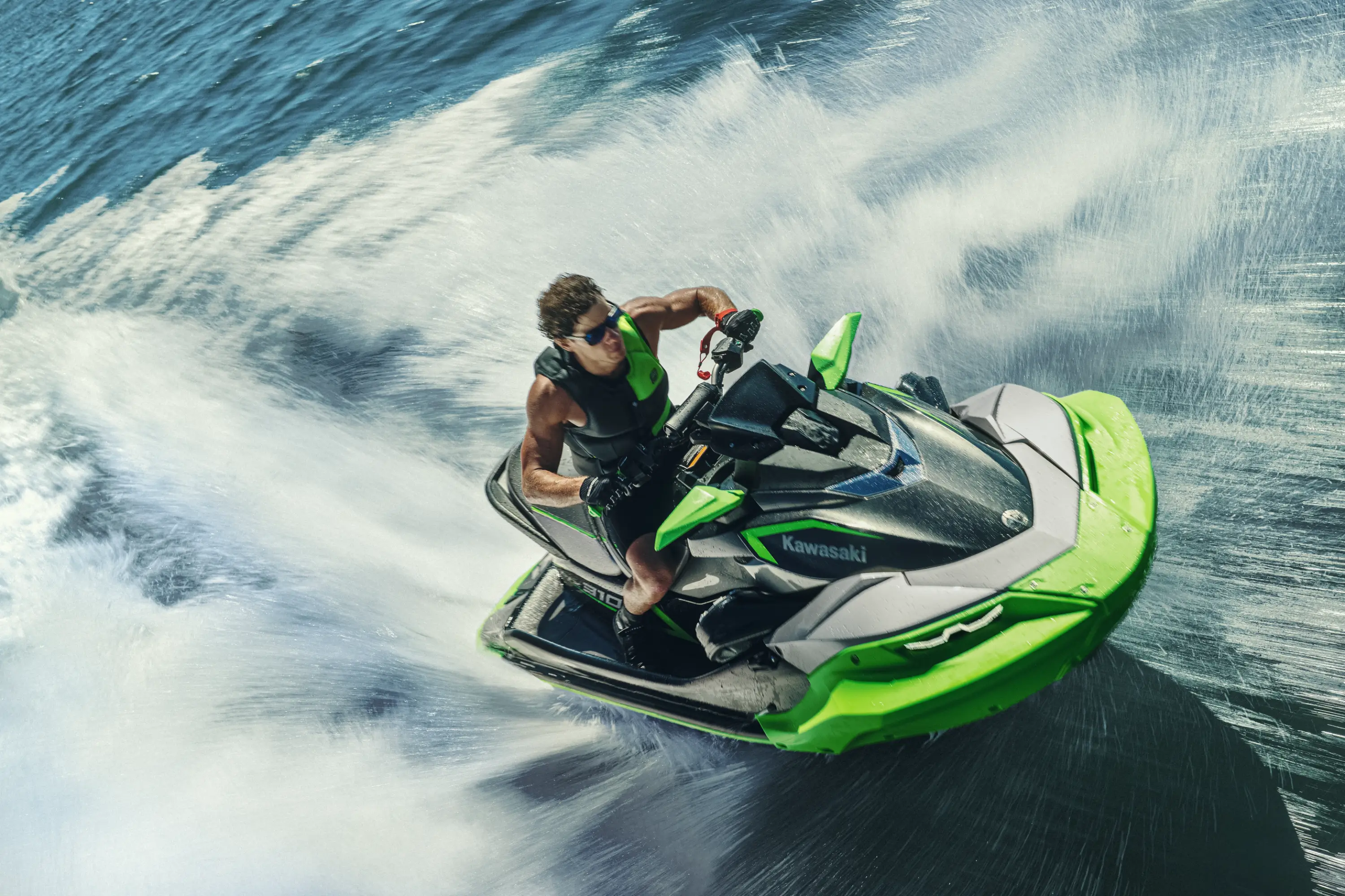 Overhead of a person on a personal watercraft.