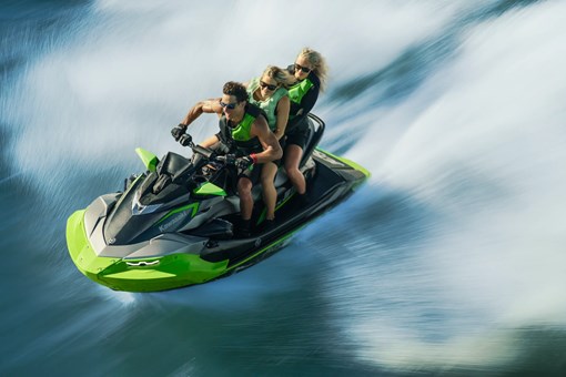 Overhead of two people on a personal watercraft. opens in a new window
