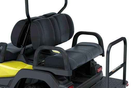 Rear seats of a Neighborhood Activity Vehicle in a white studio background. opens in a new window