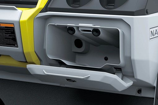 Storage right side of dash of a Neighborhood Activity Vehicle in a white studio background. opens in a new window