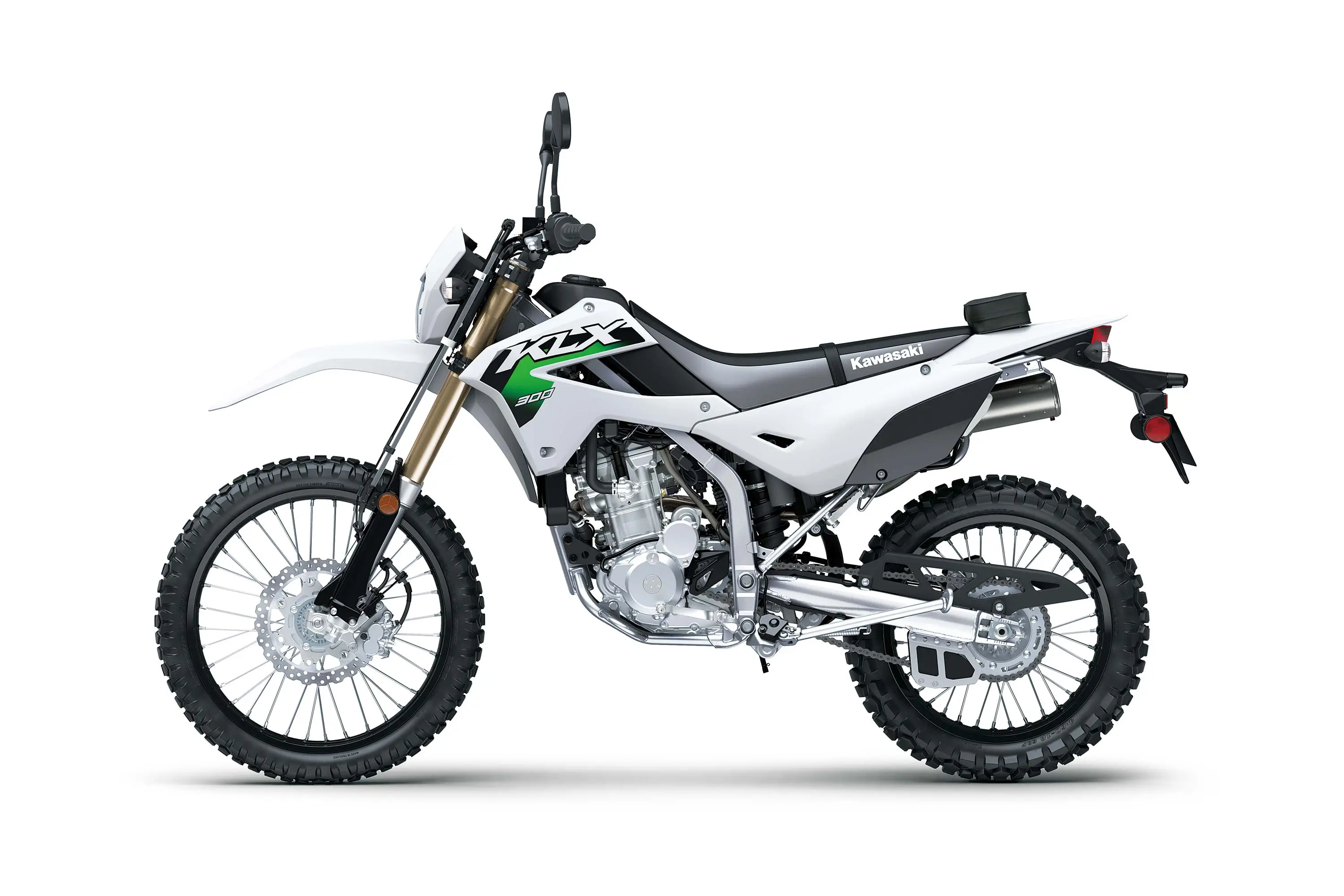 Profile angle of a white motorcycle staged in a white studio background.