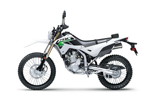 Profile angle of a white motorcycle staged in a white studio background. opens in a new window