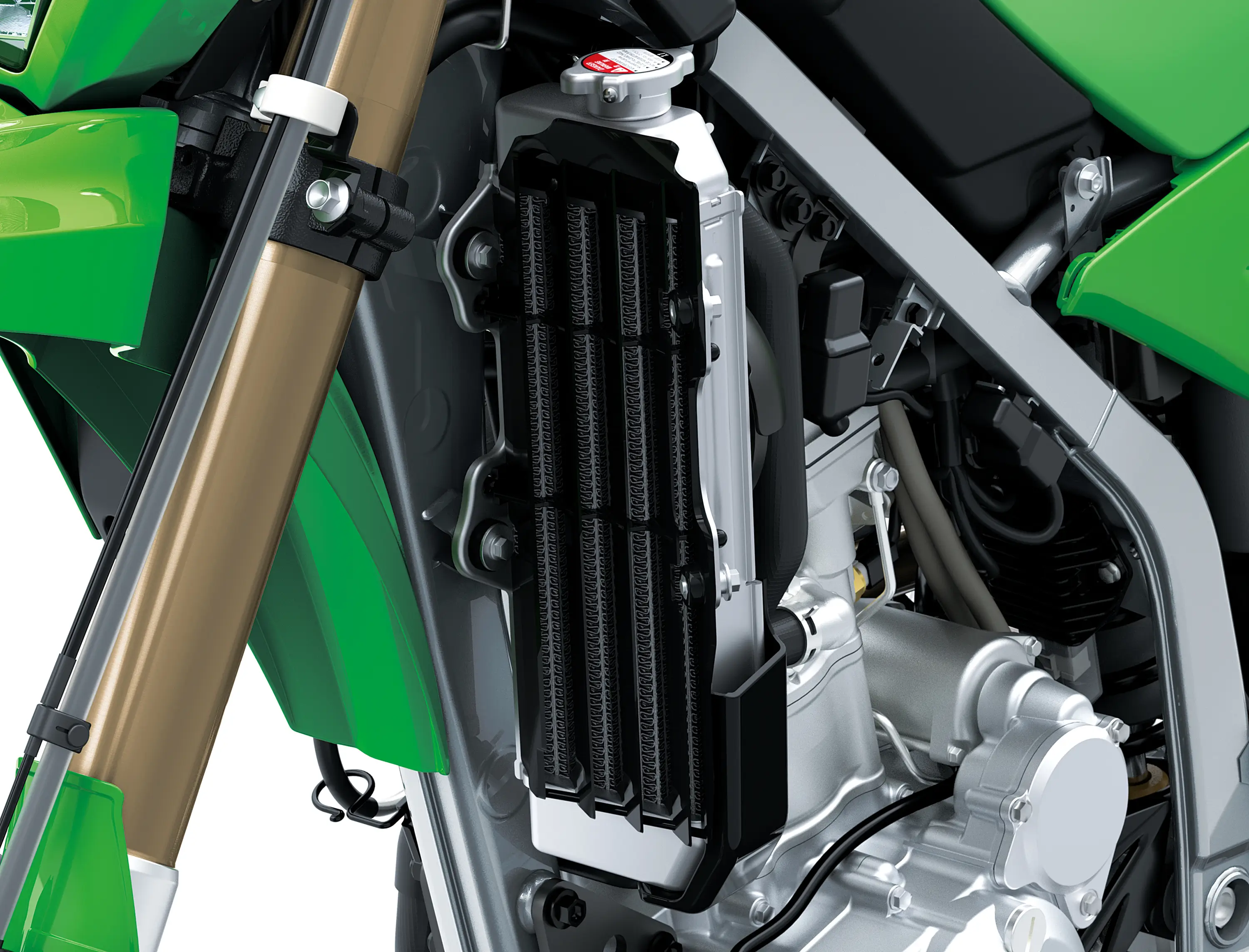 Radiator of a motorcycle staged in a white studio background.