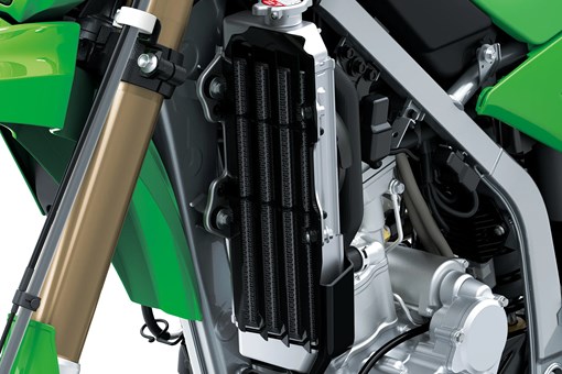 Radiator of a motorcycle staged in a white studio background. opens in a new window