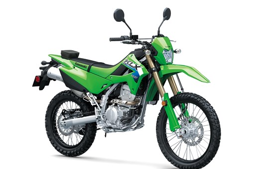Three-quarter front angle of a green motorcycle staged in a white studio background. opens in a new window