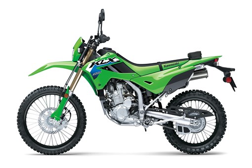 Side angle of a green motorcycle staged in a white studio background. opens in a new window