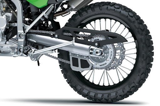 Rear wheel of a motorcycle staged in a white studio background. opens in a new window