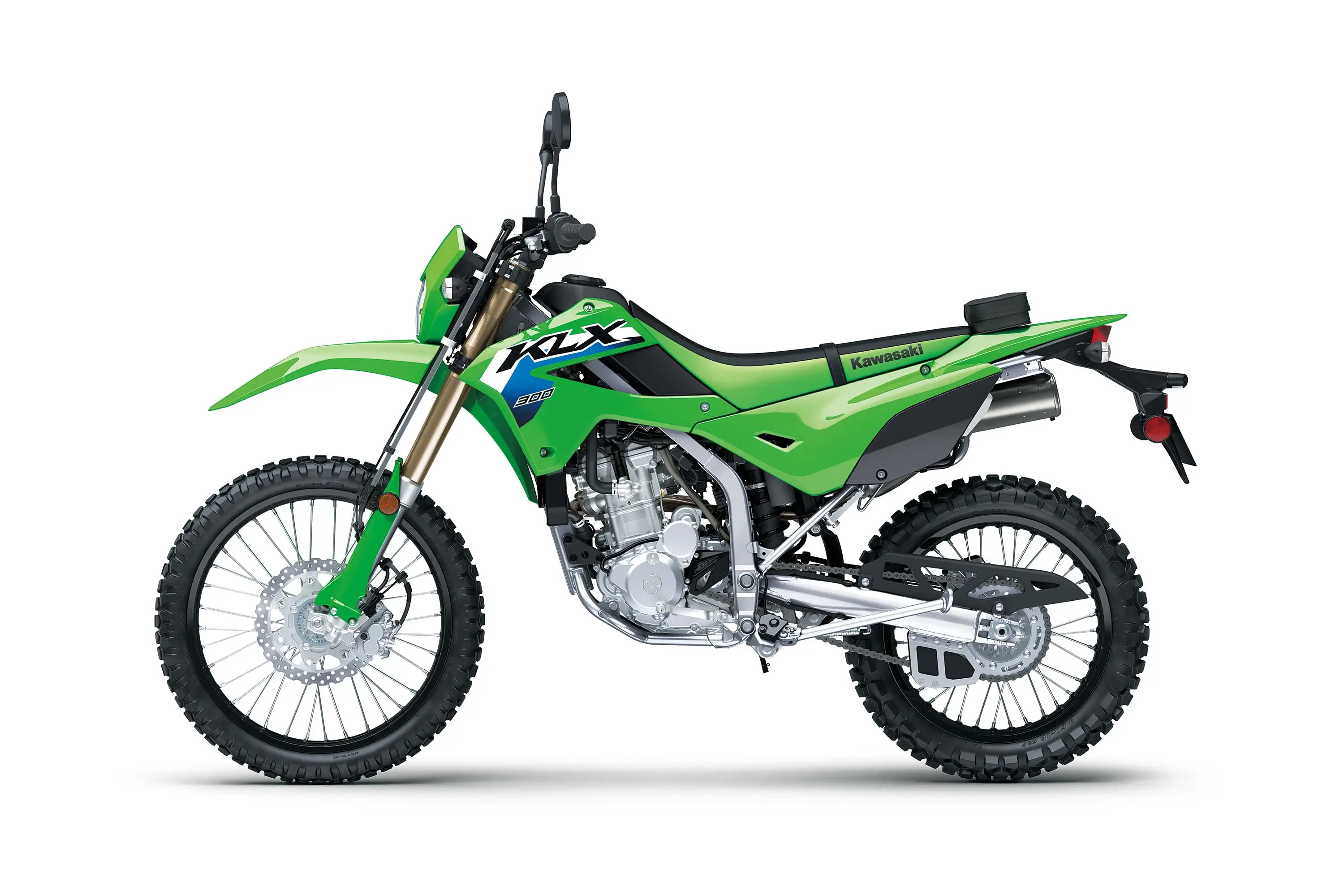 Side angle of a green motorcycle staged in a white studio background.