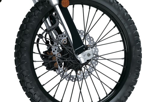 Front wheel of a motorcycle staged in a white studio background. opens in a new window