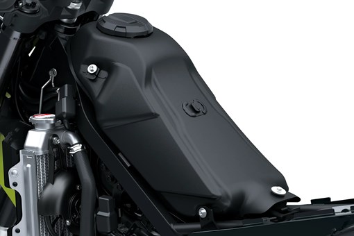 Under seat of a motorcycle staged in a white studio background. opens in a new window