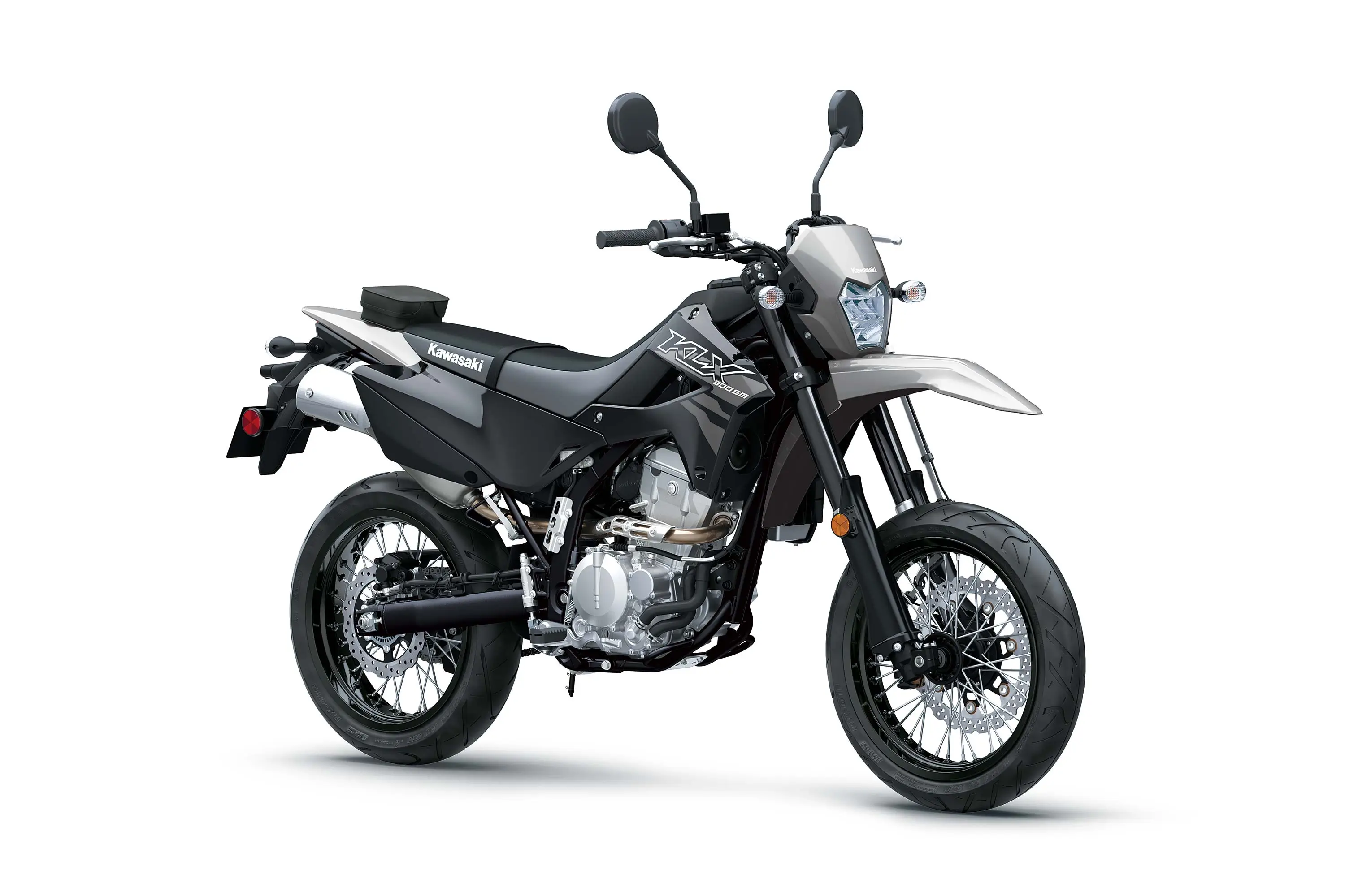 Three-quarter front angle of a grey motorcycle staged in a white studio background.