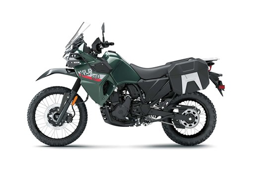 Side angle of a green motorcycle staged in a white studio background. opens in a new window