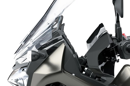 Side of the nose of a motorcycle staged in a white studio background. opens in a new window