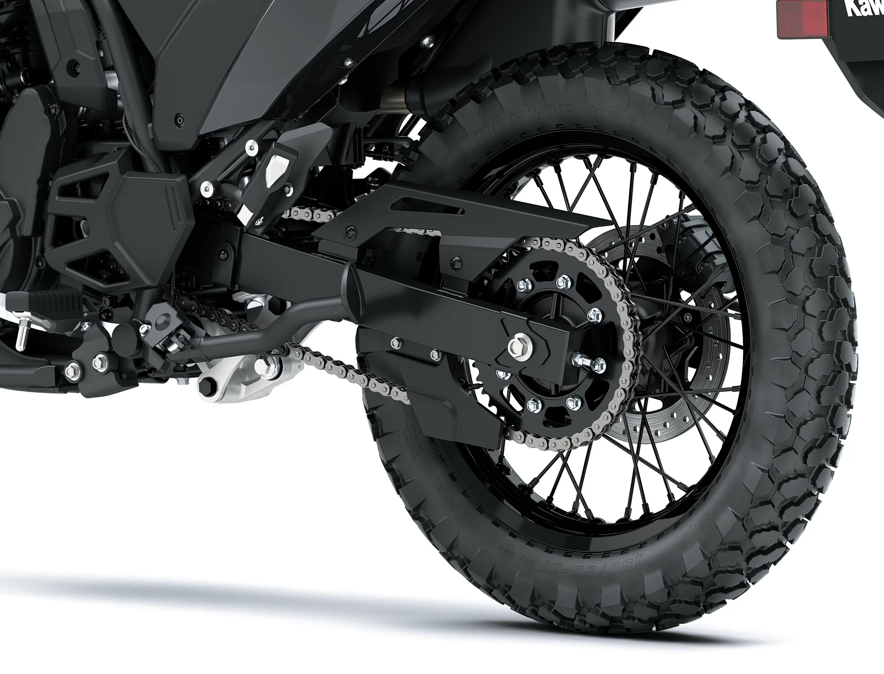 Rear wheel of a motorcycle staged in a white studio background.