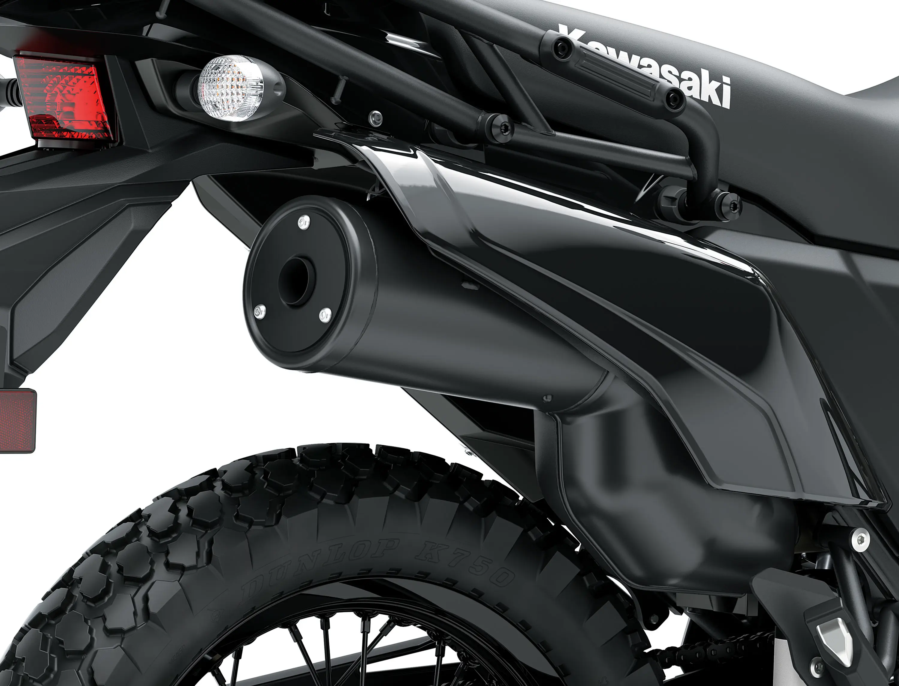 Exhaust of a motorcycle staged in a white studio background.