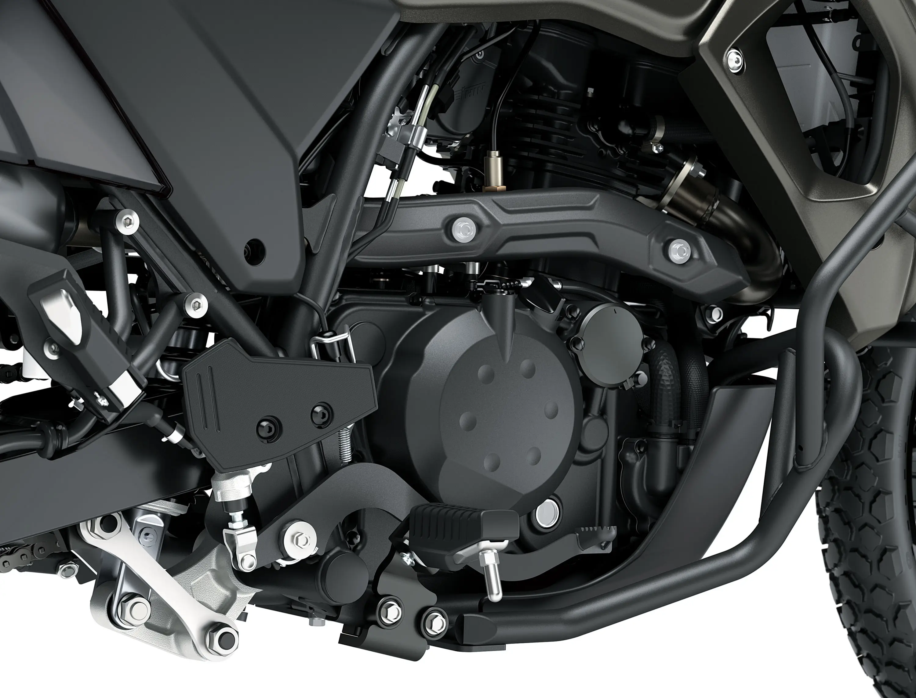 Engine of a motorcycle staged in a white studio background.