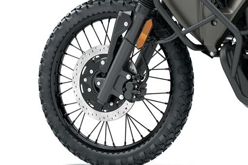 Front wheel of a motorcycle staged in a white studio background. opens in a new window