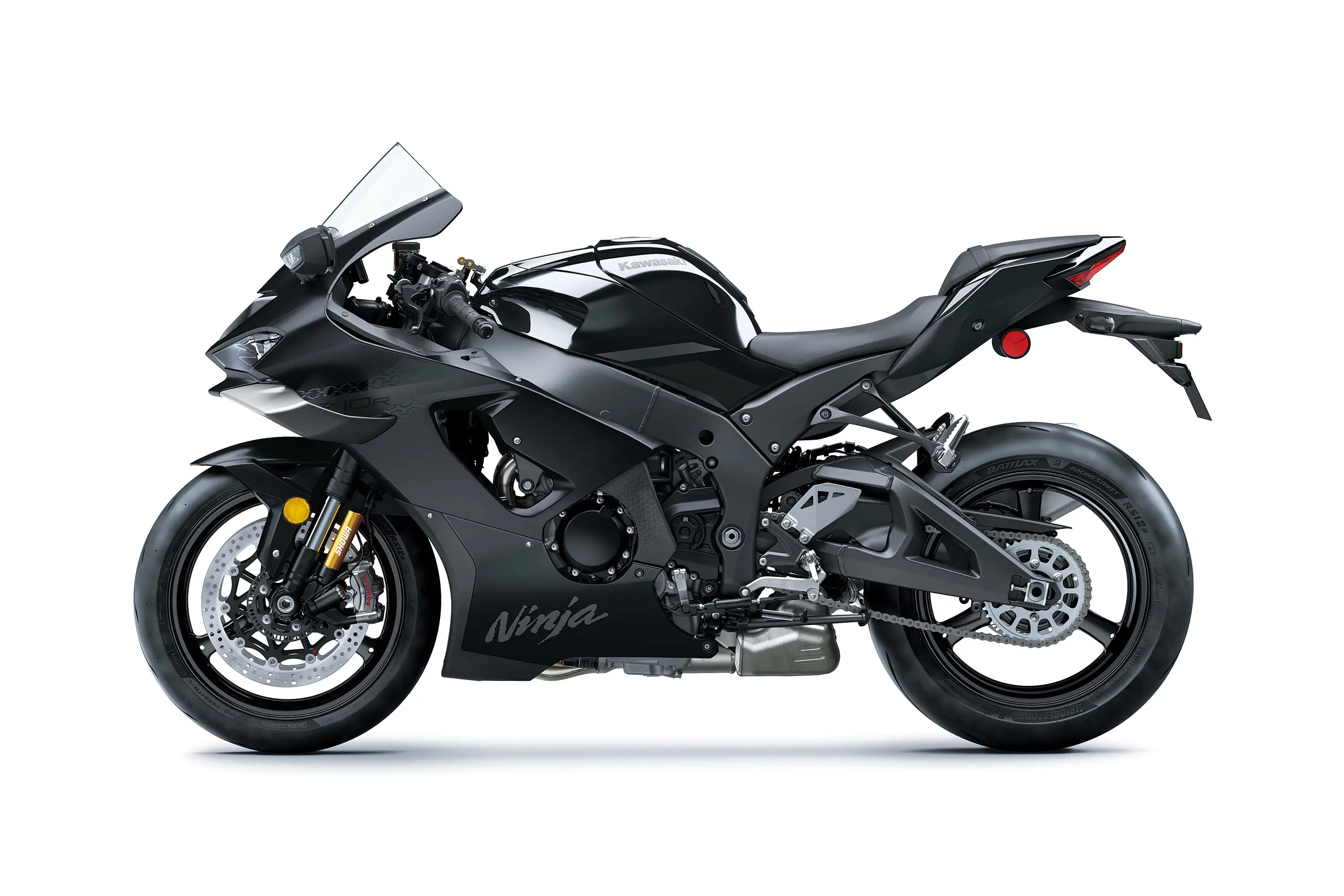 Profile angle of a black motorcycle staged in a white studio background.