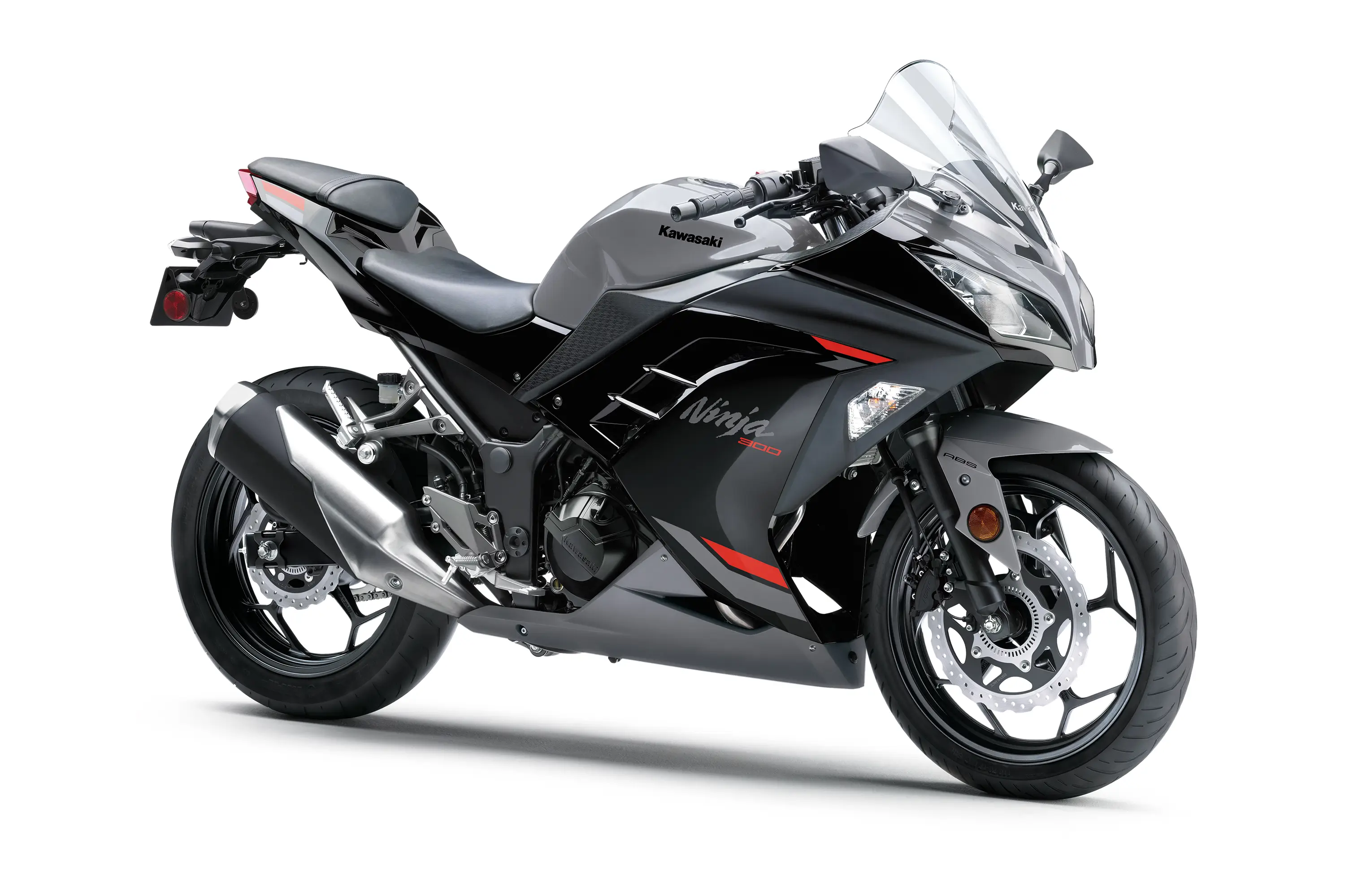 Three-quarter front angle of a grey motorcycle staged in a white studio background.