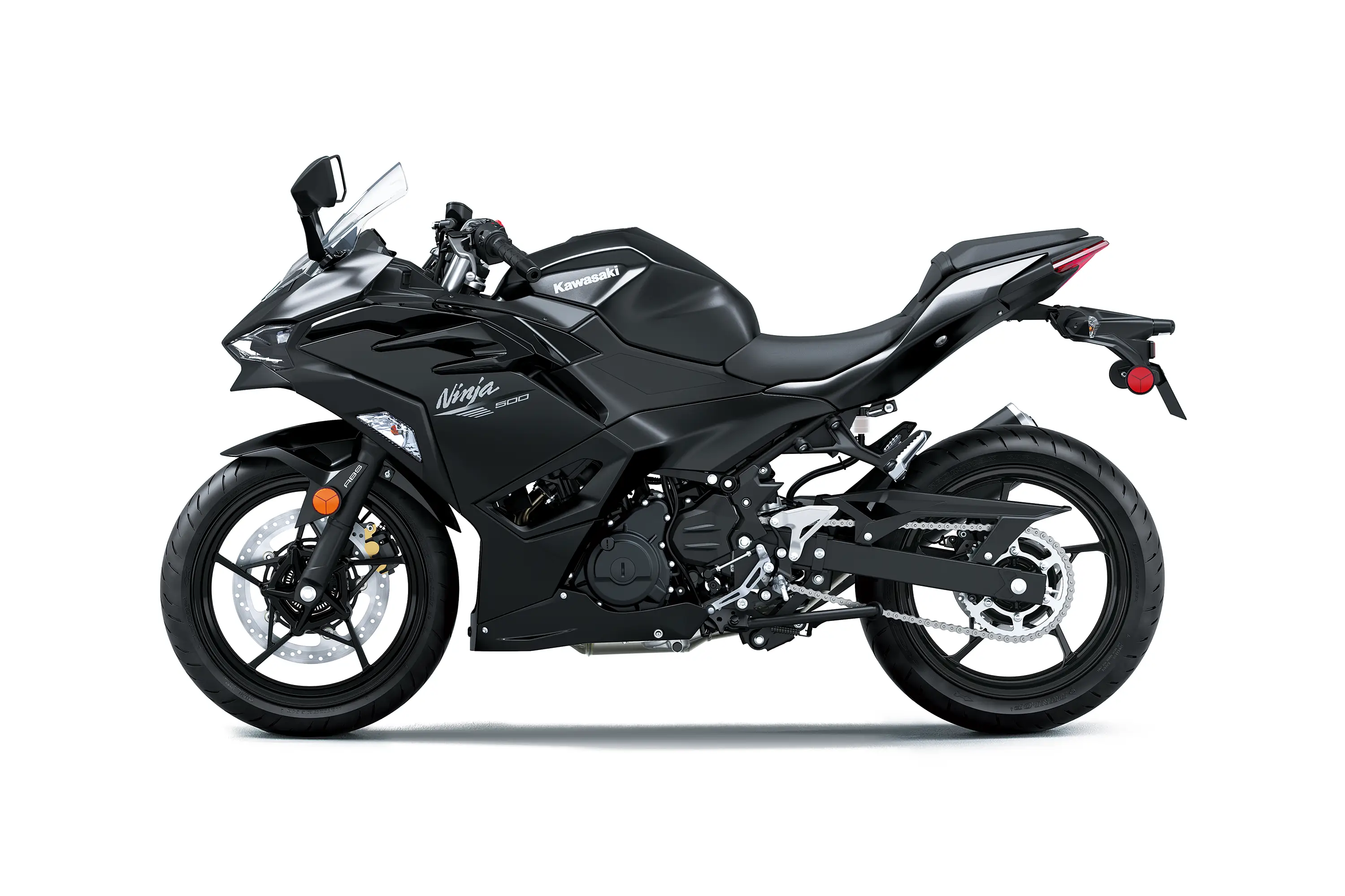 Side angle of a black motorcycle staged in a white studio background.