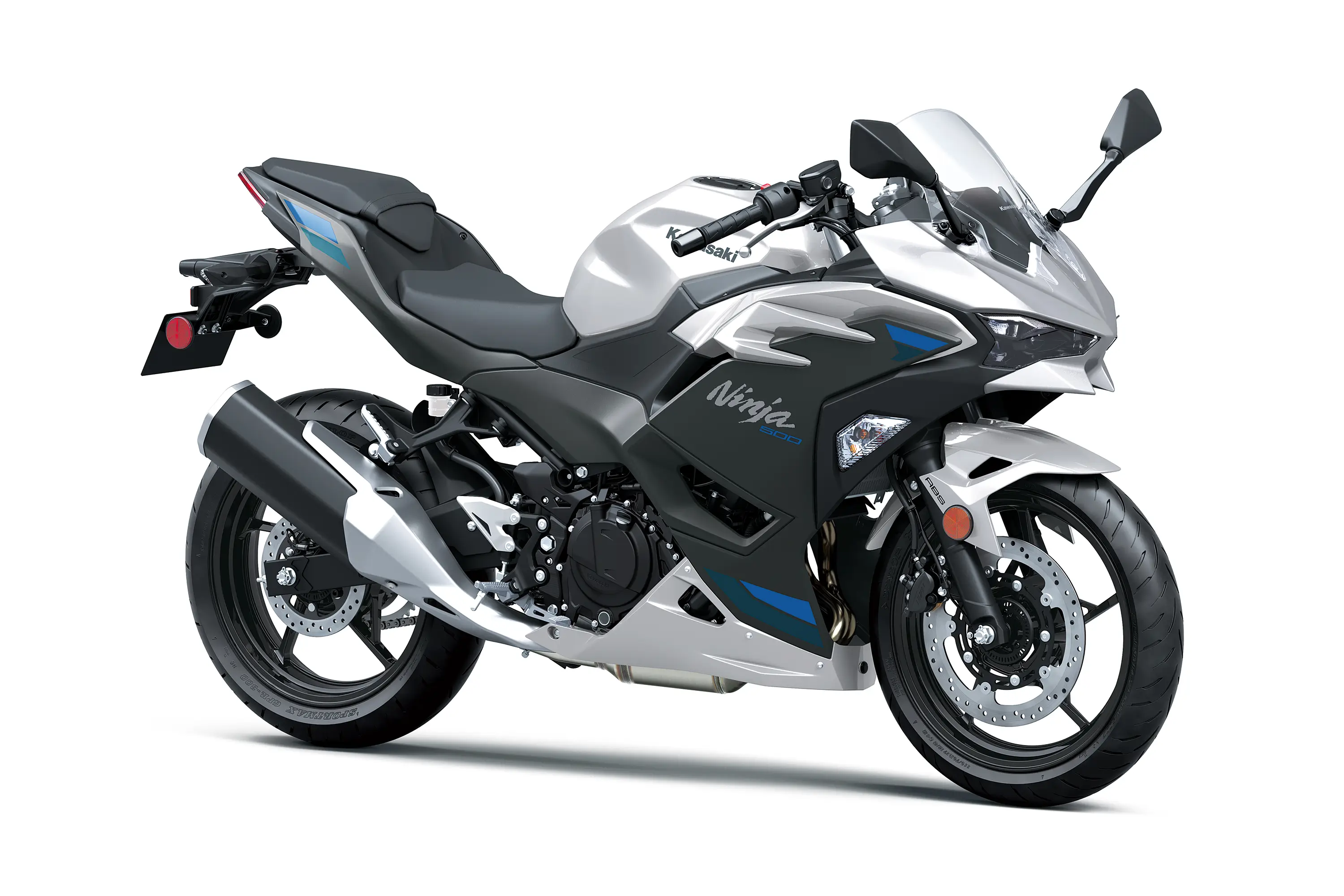Three-quarter front angle of a silver motorcycle staged in a white studio background.