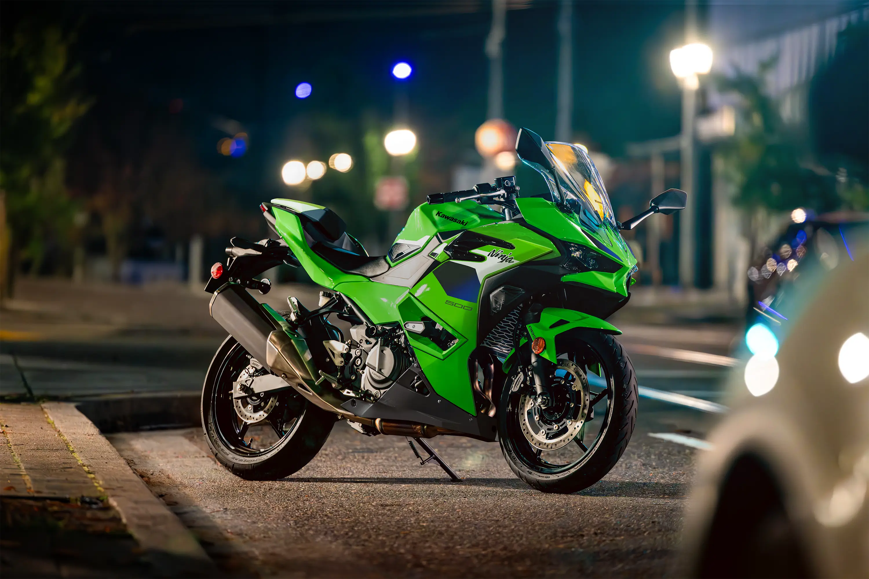 Side view of a motorcycle parked in the street.