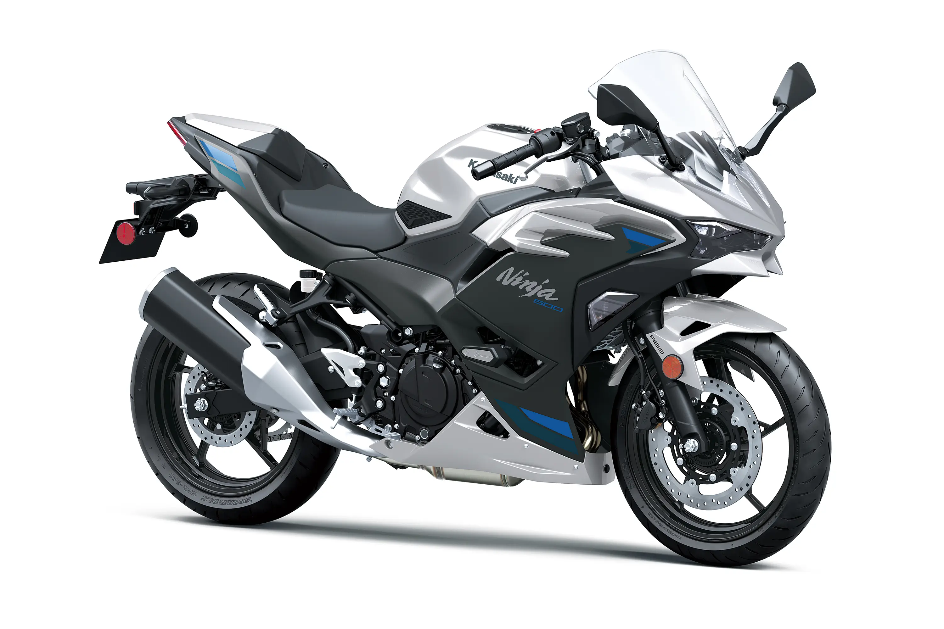 Three-quarter front angle of a silver motorcycle staged in a white studio background.