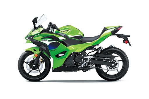 Side angle of a green motorcycle staged in a white studio background. opens in a new window