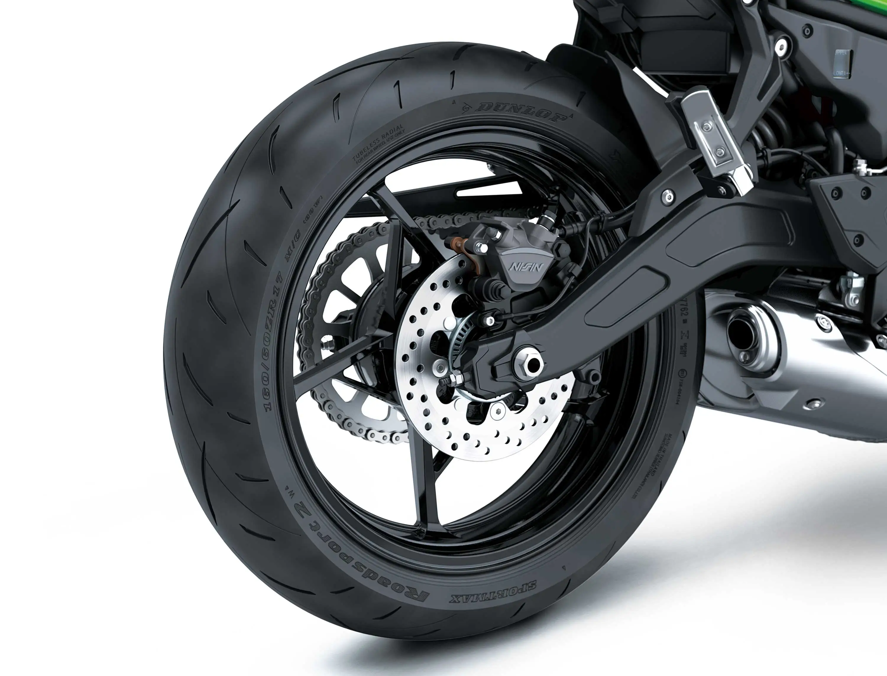 Back wheel of a motorcycle staged in a white studio background.