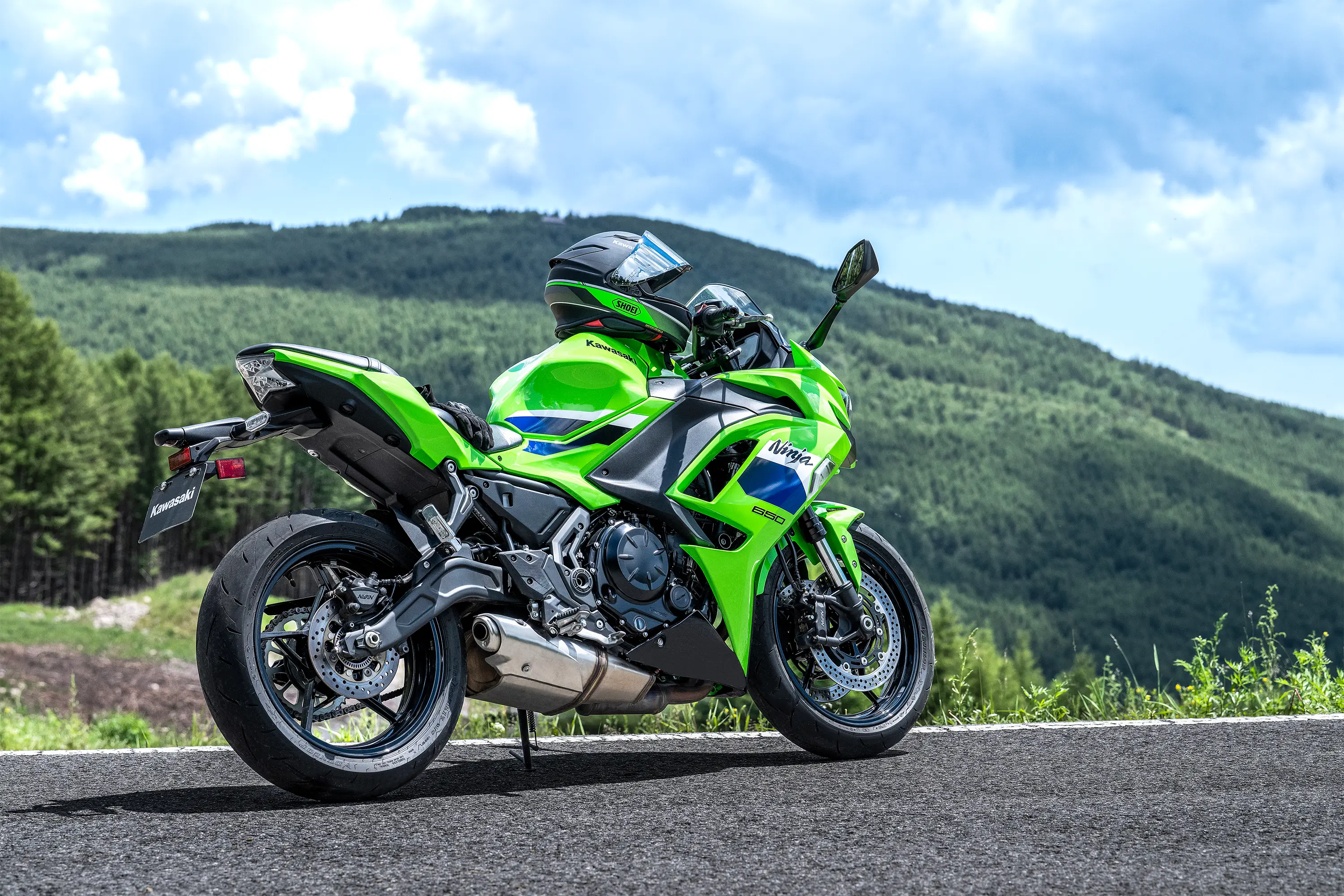 Three-quarter rear angle of a motorcycle parked.