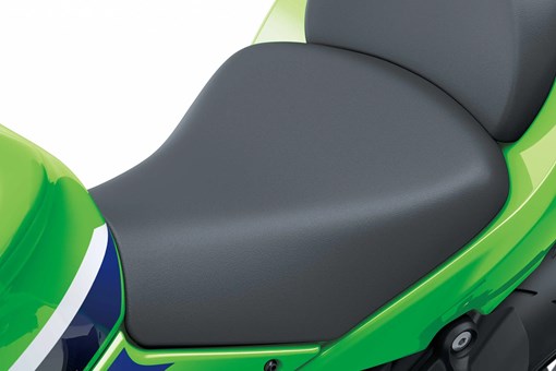 Seat of a motorcycle staged in a white studio background. opens in a new window