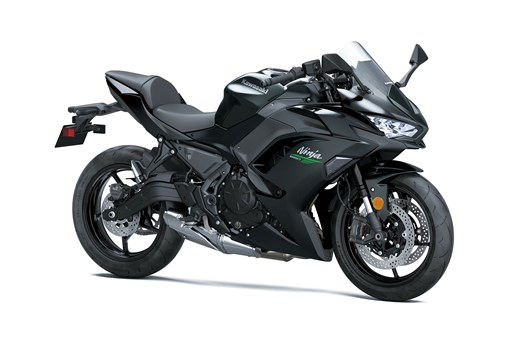 Three-quarter front angle of a grey motorcycle staged in a white studio background. opens in a new window