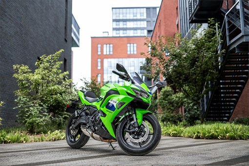 Three-quarter front angle of a motorcycle parked. opens in a new window
