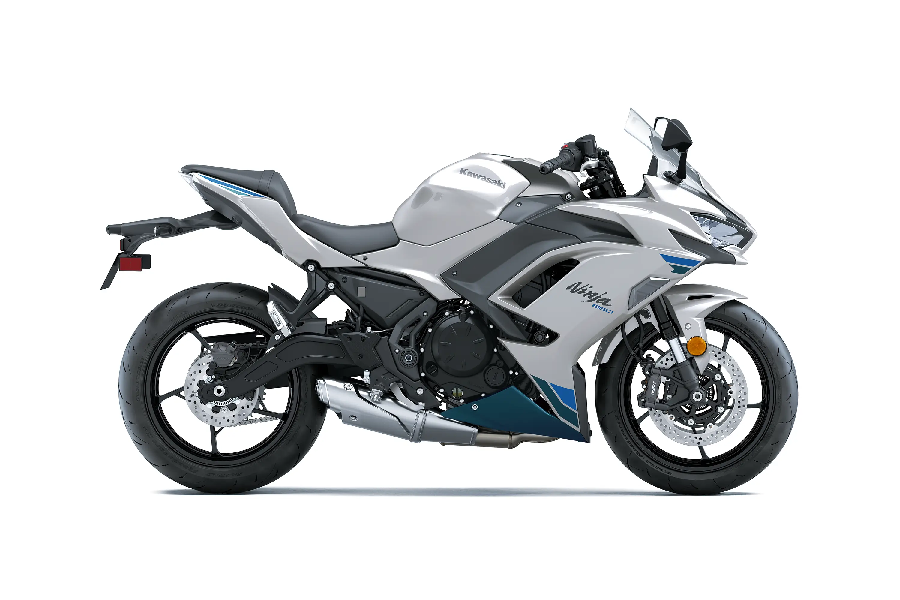 Profile angle of a white motorcycle staged in a white studio background.