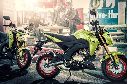 Side angle of two motorcycles parked. opens in a new window