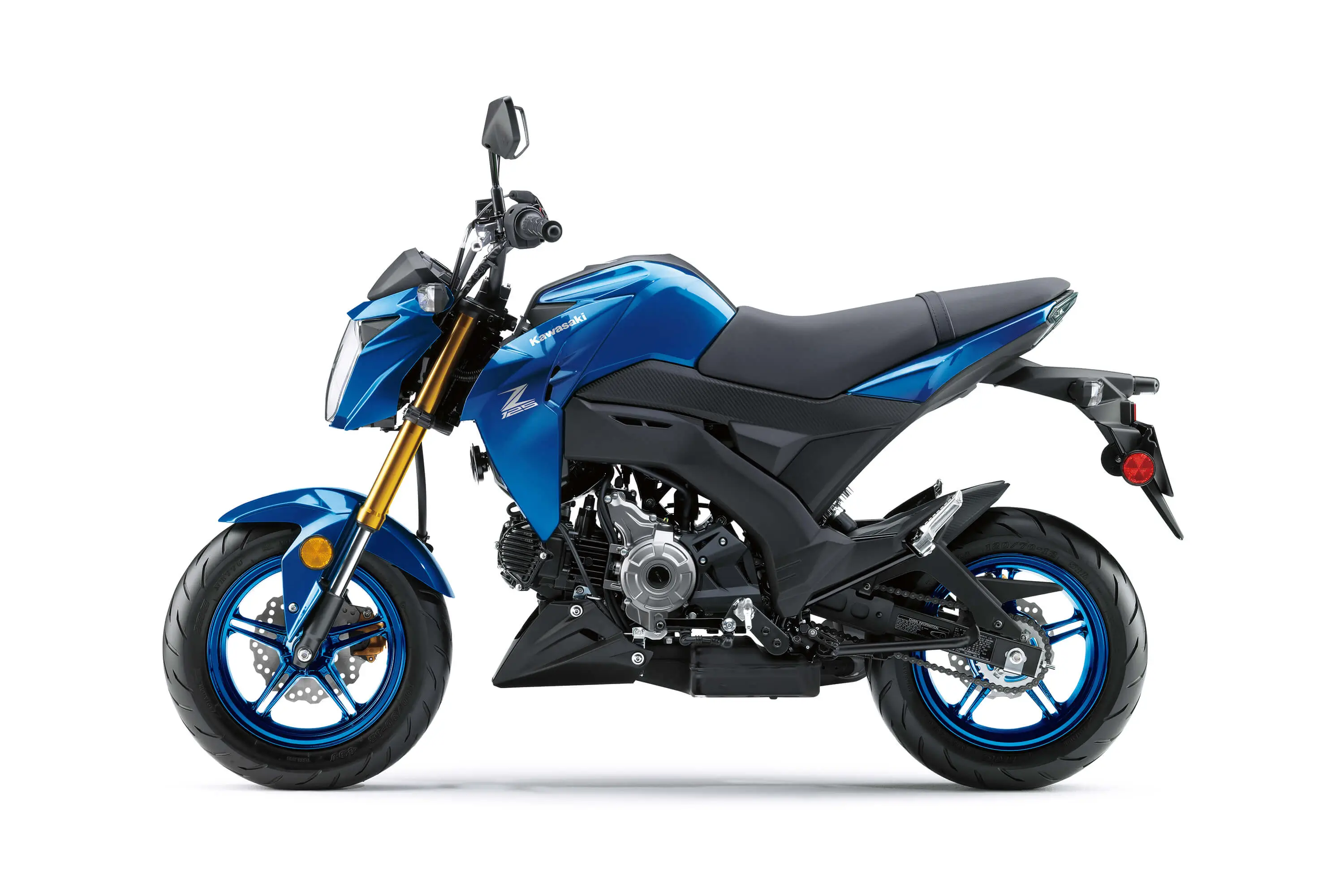 Profile angle of a blue motorcycle staged in a white studio background.