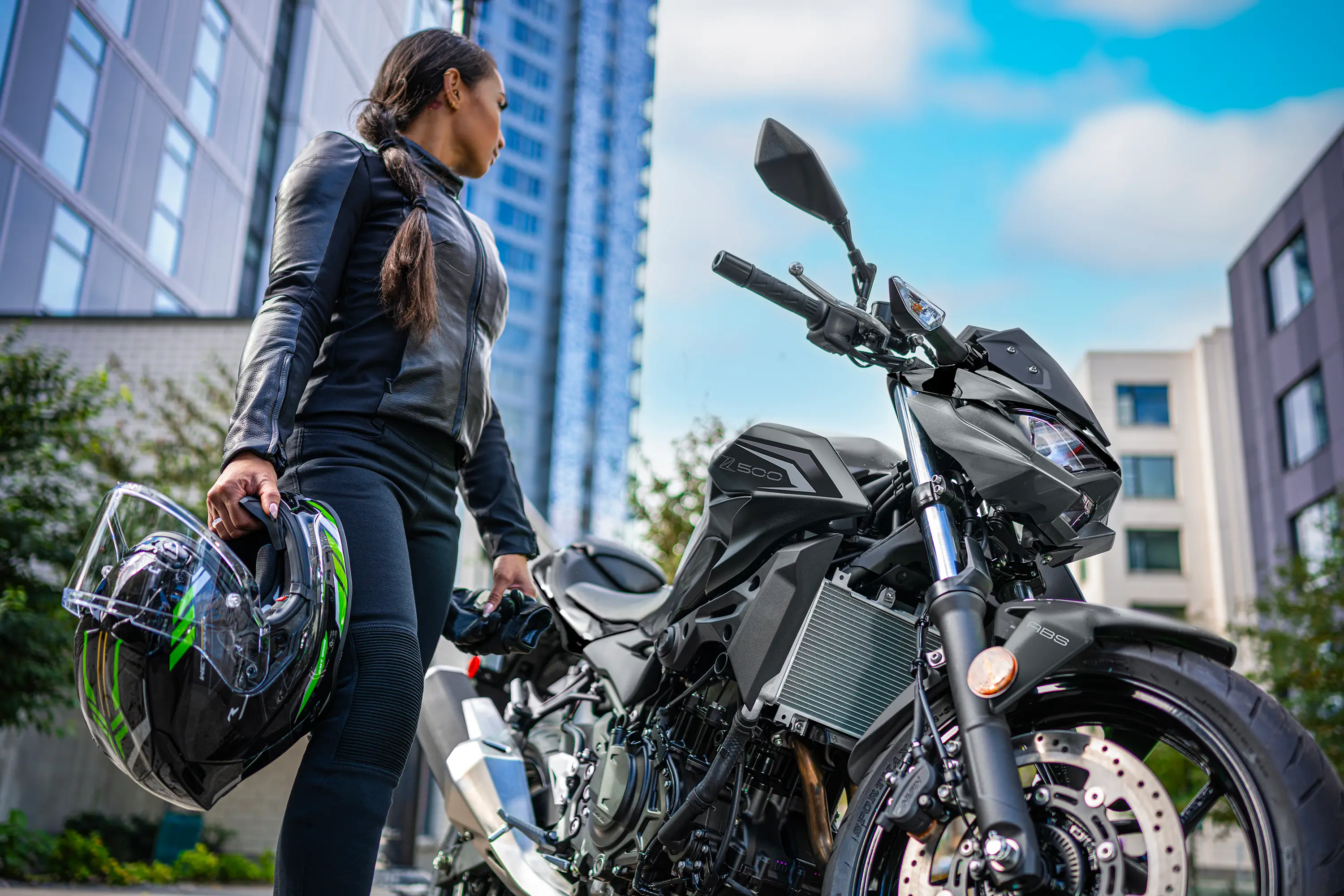 Three-quarter front angle of a motorcycle parked.